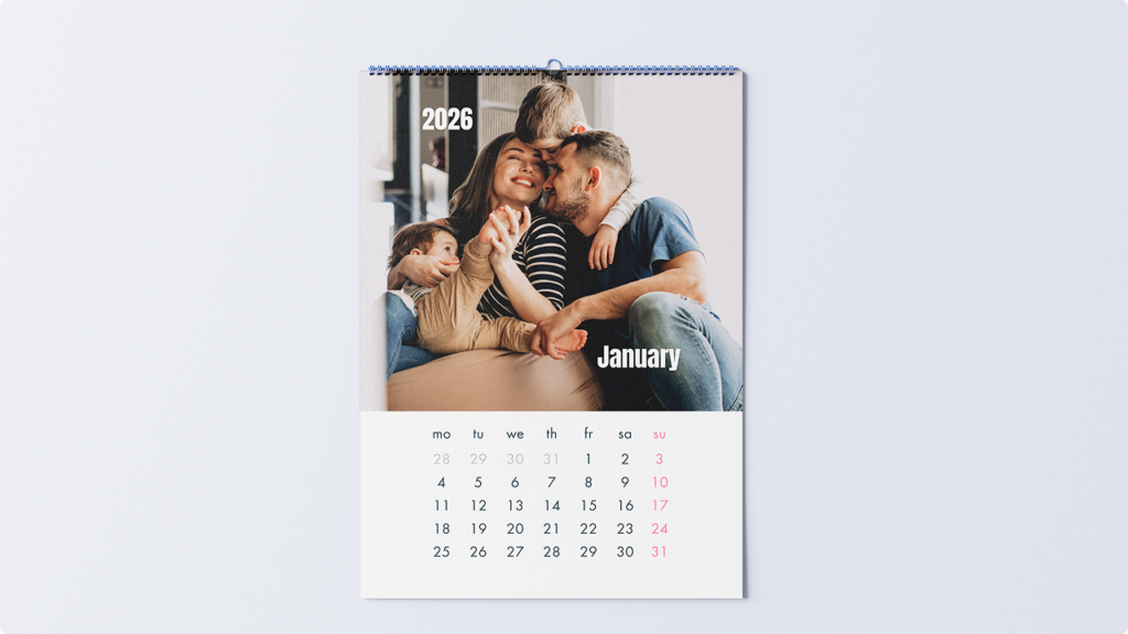 January 2026 calendar page featuring a smiling family portrait above the date grid.