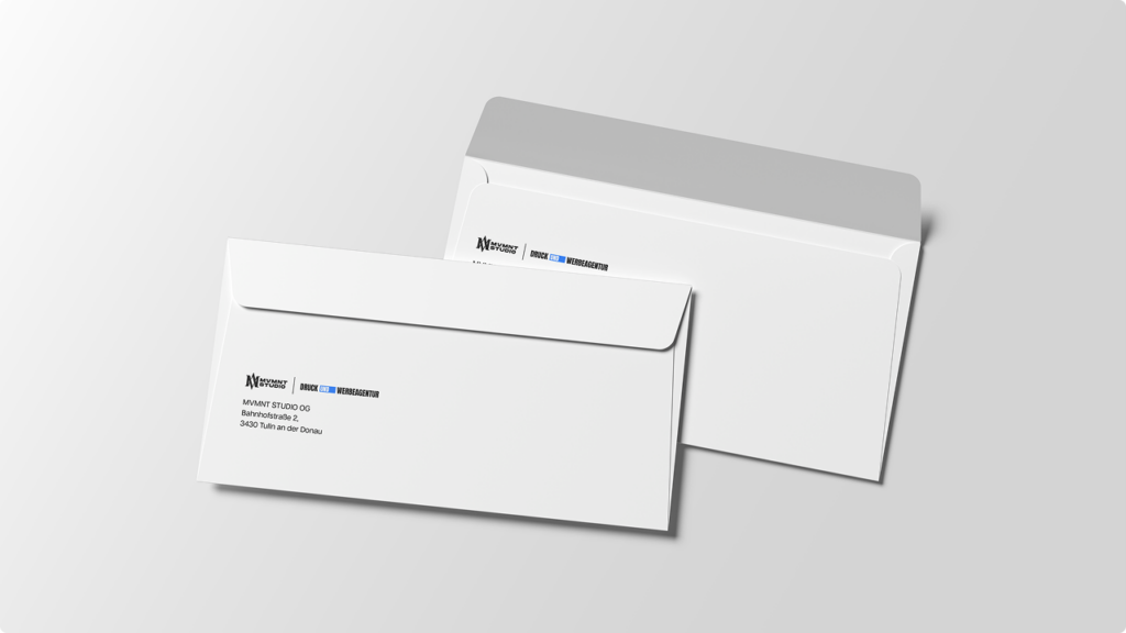 Two white business envelopes with a small printed logo and address on the left, against a light gray gradient background.