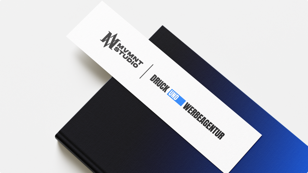 Diagonal white business card with a bold logo across a dark gradient notebook backdrop.